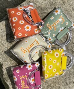 Shop 2-piece transparent floral daisy bag with hot pink soft pouch, crystal handles, and adjustable shoulder strap. Stylish 2-in-1 design with fast delivery.